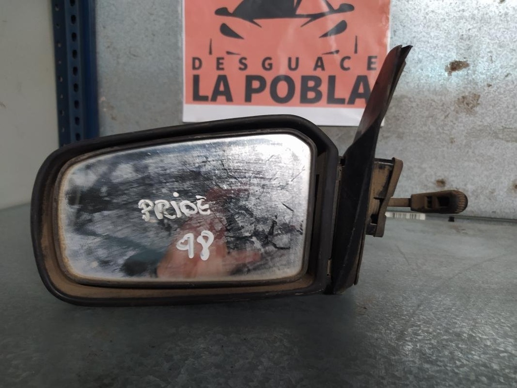 Retrovisor izquierdo - Kia Pride (DA) (1.3i (64 cv) Automatico) (1998)