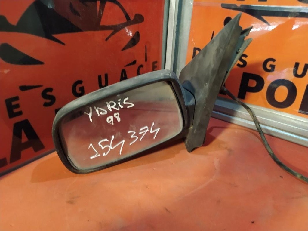 Retrovisor izquierdo - Toyota Yaris I (1.0i 16V (68 cv)) (1998)