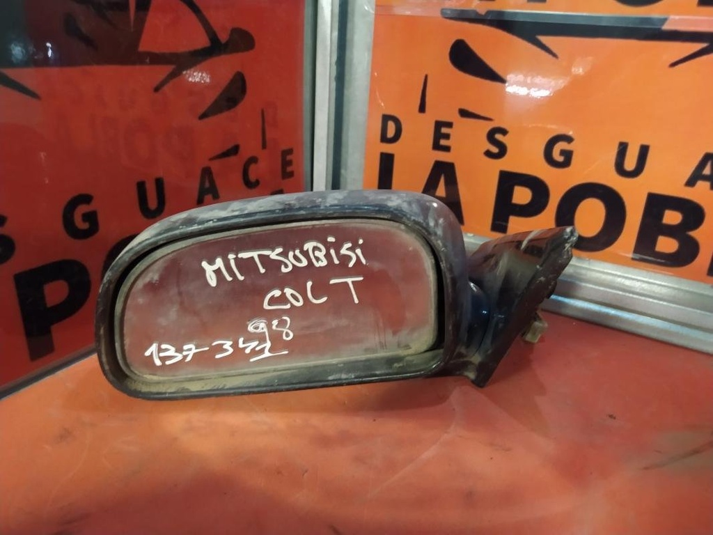Retrovisor izquierdo - Mitsubishi Colt III (C50) (1.3 (C51A) (70 cv)) (1998)